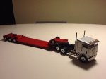 (image for) Freightliner with step deck trailer silver red